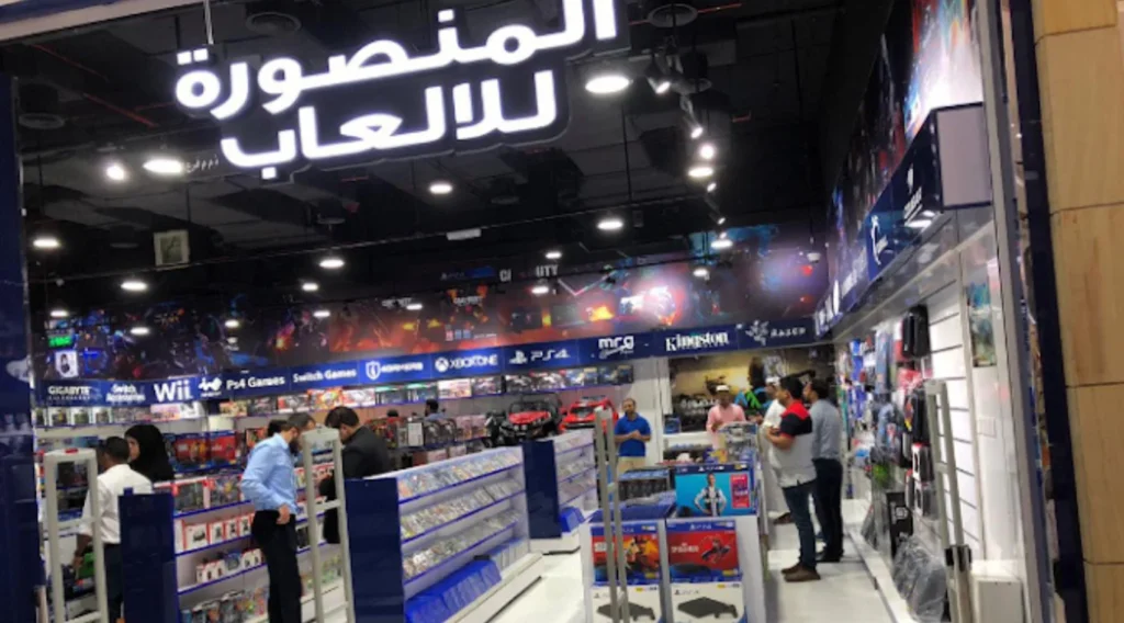 Al Mansoora Games LLC storefront and entrance in Abu Dhabi gaming district.